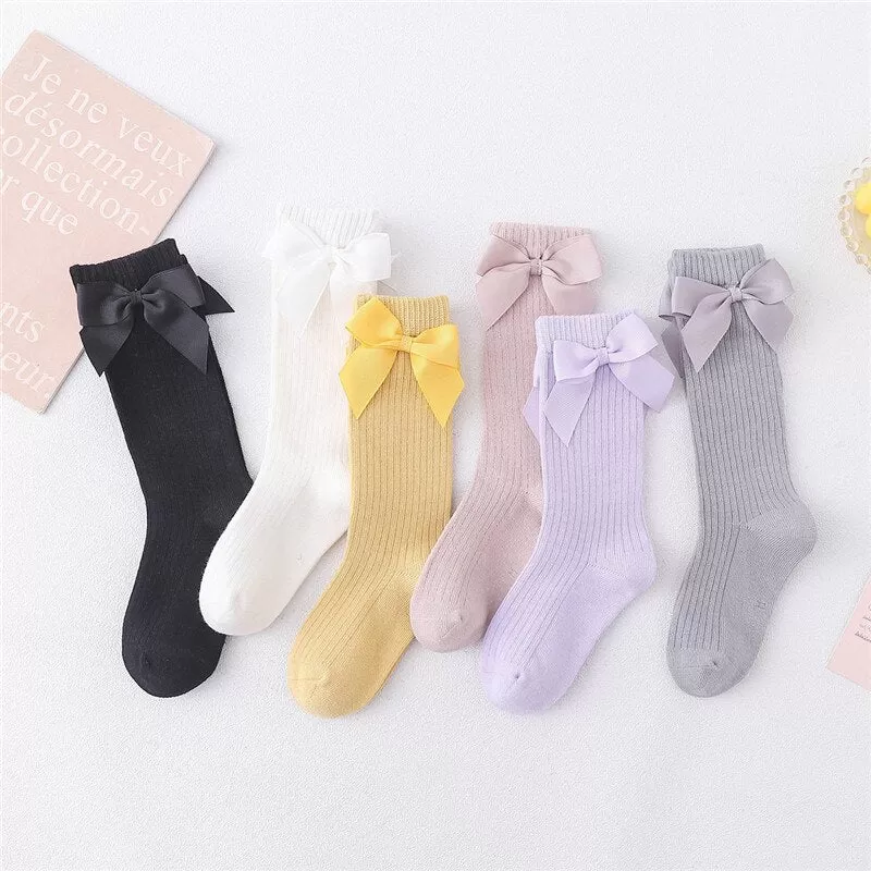 Seasonal Elegance: Delicate Bow Adorned Knee High Socks for Girls