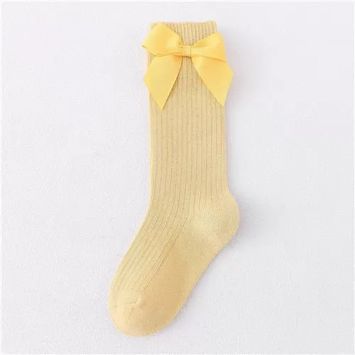 Seasonal Elegance: Delicate Bow Adorned Knee High Socks for Girls